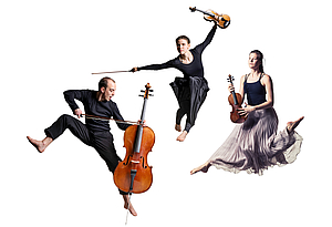 The picture shows three jumping musicians with string instruments.